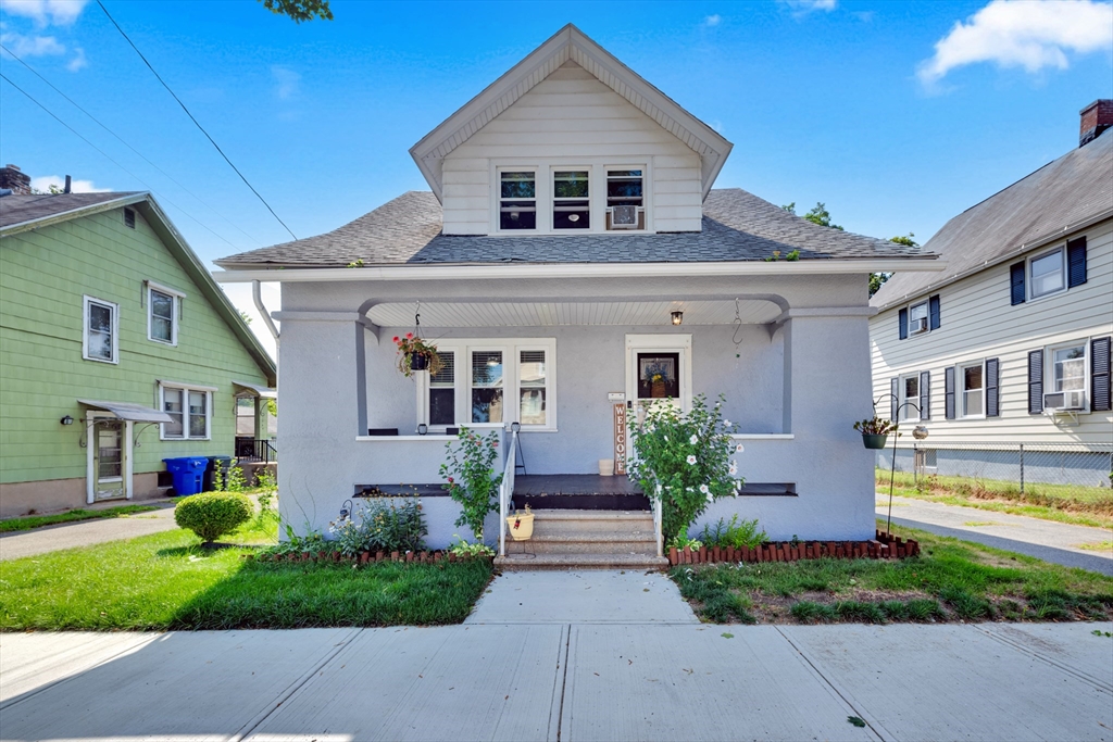 29 Sterling Street Springfield, MA 01107 - Photo 1 of 38 a front view of a house with garden
