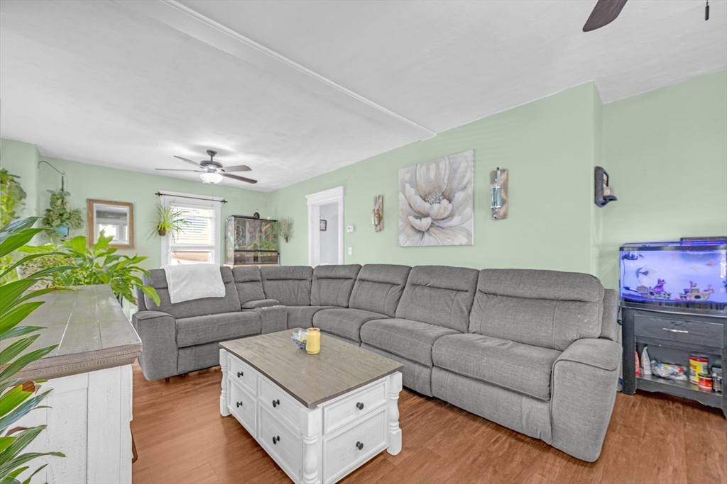 29 Sterling Street Springfield, MA 01107 - Photo 10 of 38 a living room with furniture and a couch