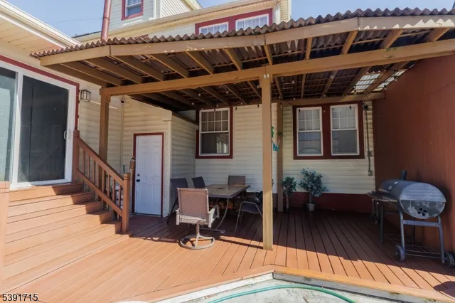a view of a balcony with chairs
