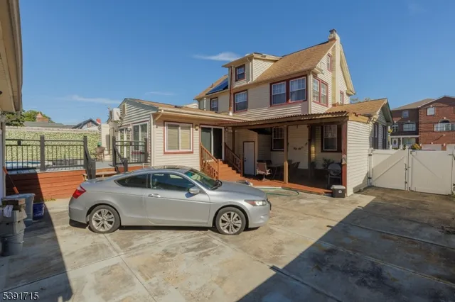a car parked in front of a house