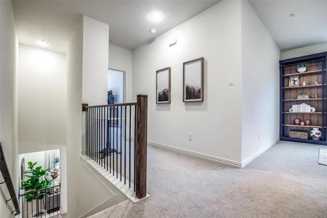 a view of hallway with livingroom