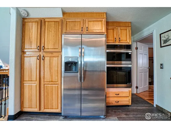 a bathroom with a sink a mirror and shower