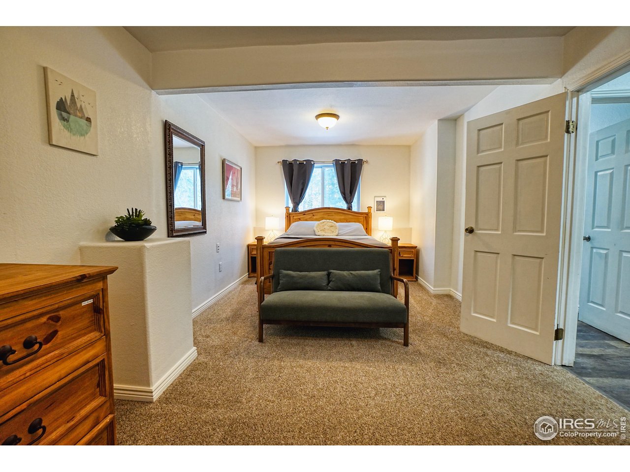 2170 Apex Valley Road Black Hawk, CO 80422 - Photo 28 of 50 a en suite bathroom with a sink and a mirror