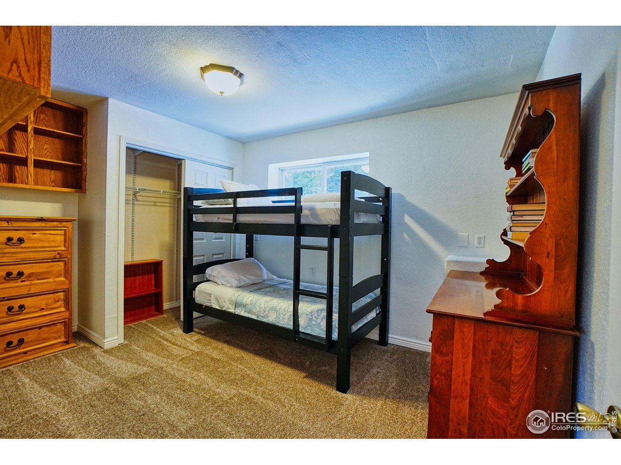 2170 Apex Valley Road Black Hawk, CO 80422 - Photo 39 of 50 a bedroom with bunk bed