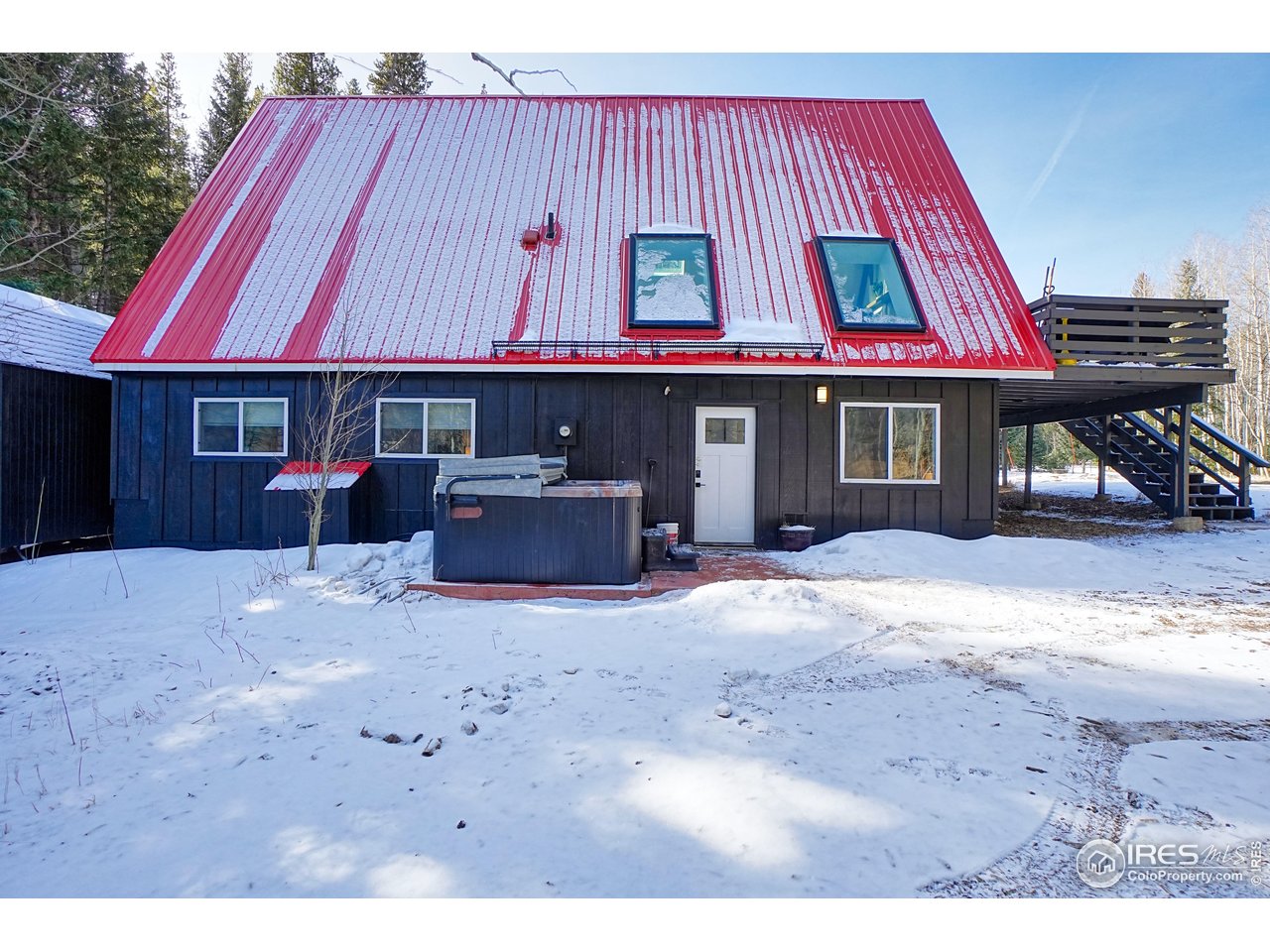 2170 Apex Valley Road Black Hawk, CO 80422 - Photo 42 of 50 a view of house with backyard and sitting area