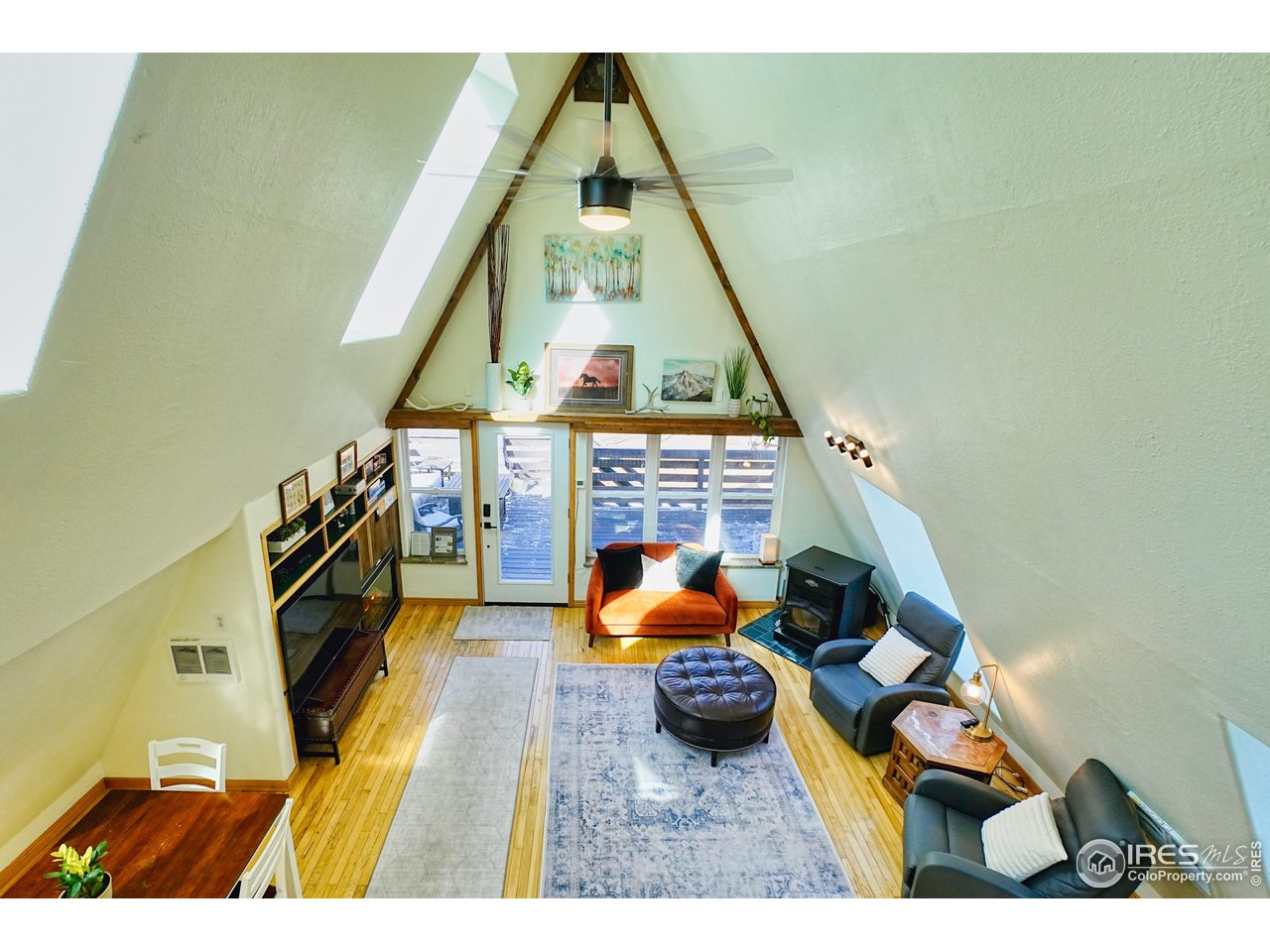 2170 Apex Valley Road Black Hawk, CO 80422 - Photo 6 of 50 a living room with furniture and a fireplace