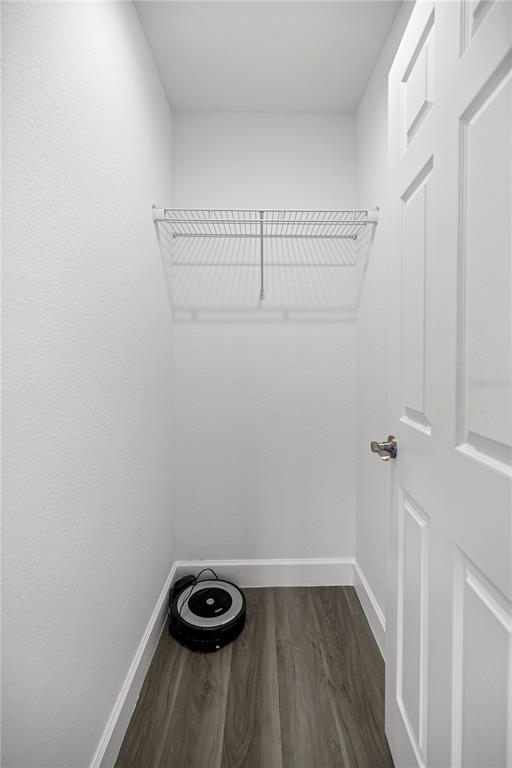 8607 Southwest 135th Street Road Ocala, FL 34473 - Photo 19 of 30 a view of a room with racks on the wall