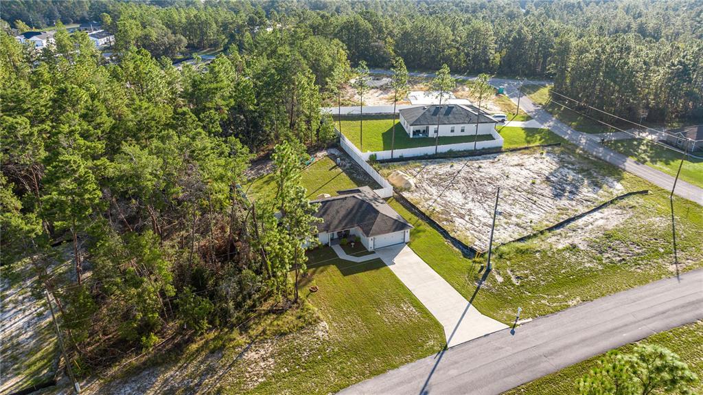 8607 Southwest 135th Street Road Ocala, FL 34473 - Photo 26 of 30 a view of a yard with an outdoor seating