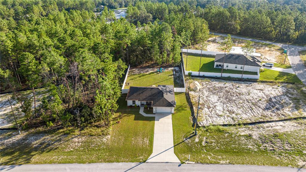 8607 Southwest 135th Street Road Ocala, FL 34473 - Photo 28 of 30 a view of a yard with an outdoor seating