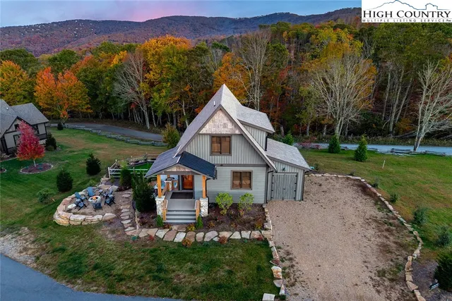 a view of house with outdoor space and street view