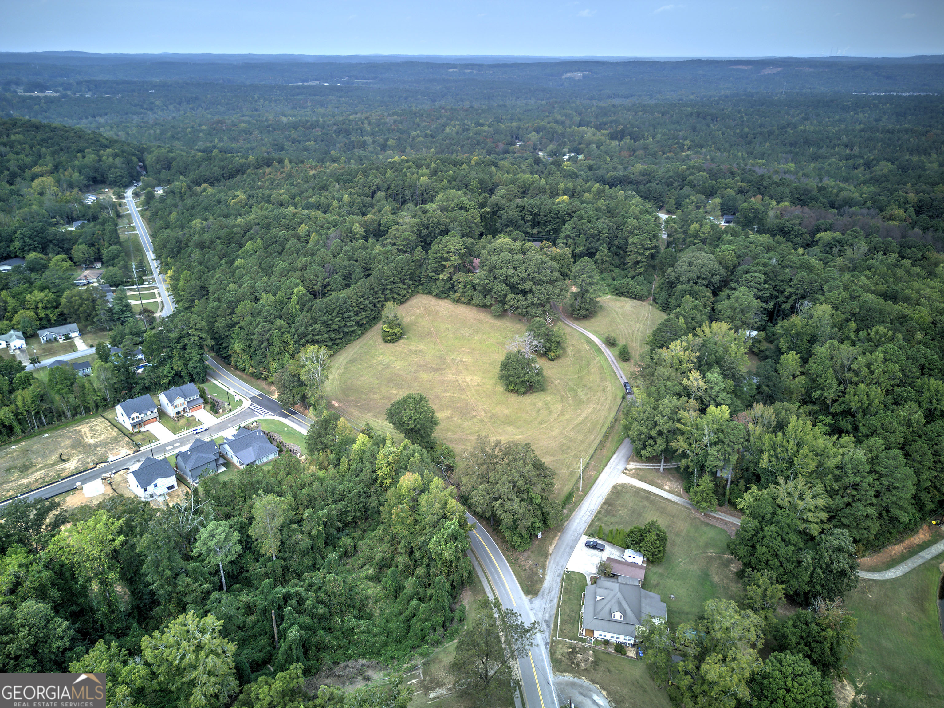 67 Polk Lane Dallas, GA 30132 - Photo 16 of 51 an aerial view of a house with a yard and outdoor seating