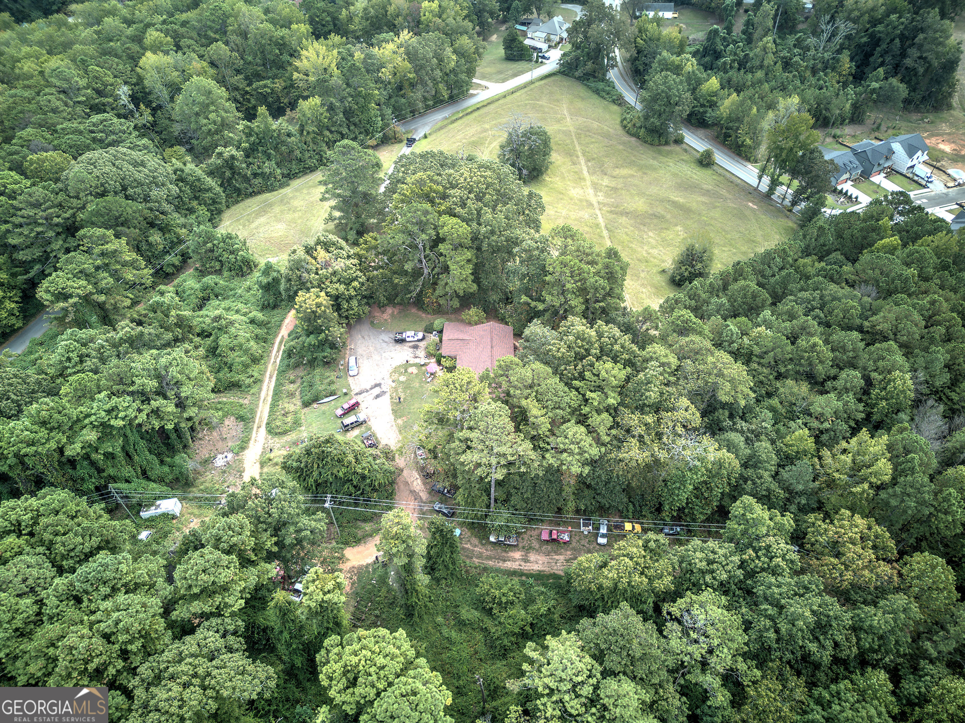 67 Polk Lane Dallas, GA 30132 - Photo 23 of 51 an aerial view of residential house with outdoor space and trees all around