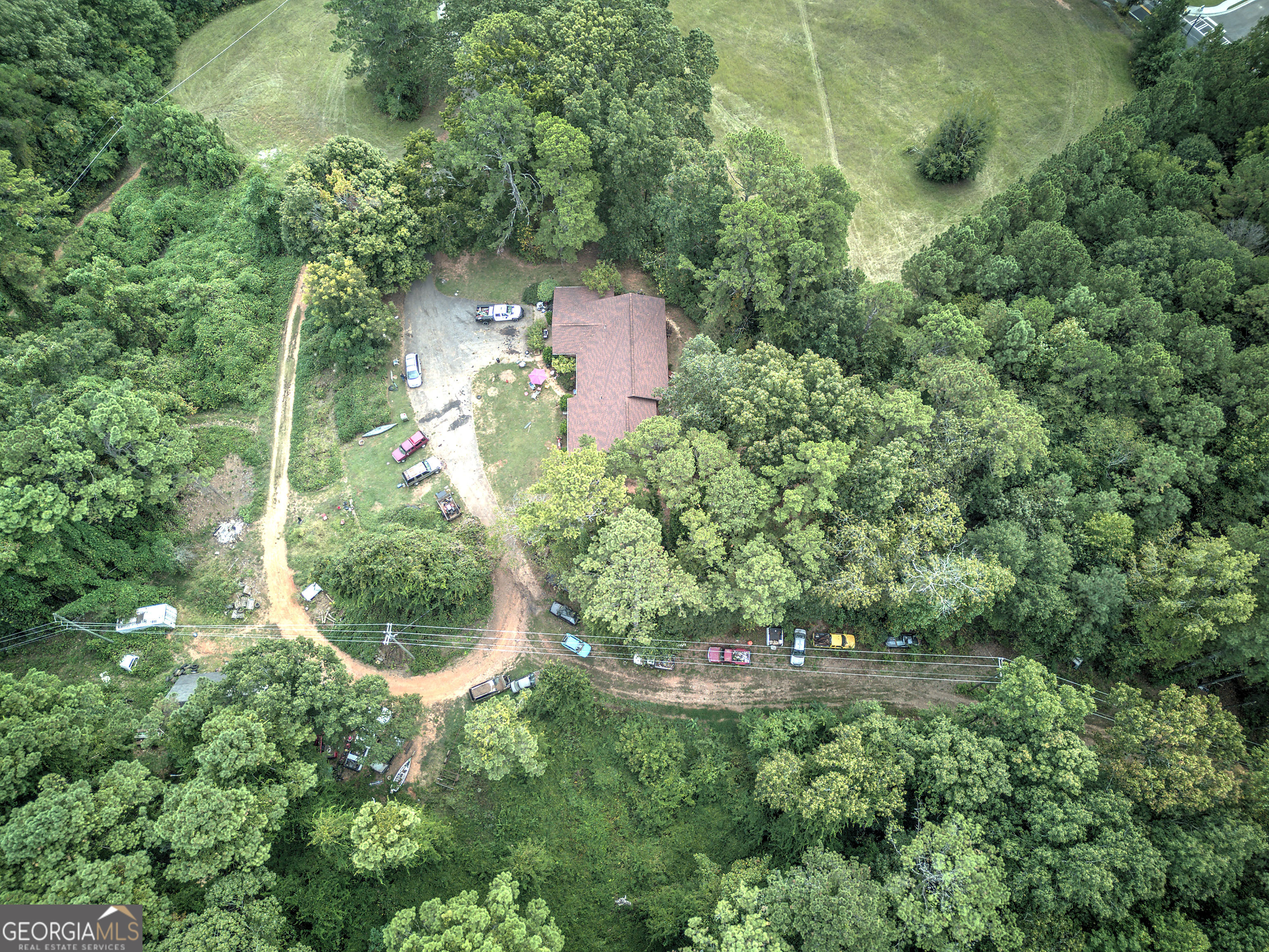 67 Polk Lane Dallas, GA 30132 - Photo 24 of 51 an aerial view of residential house with outdoor space and trees all around