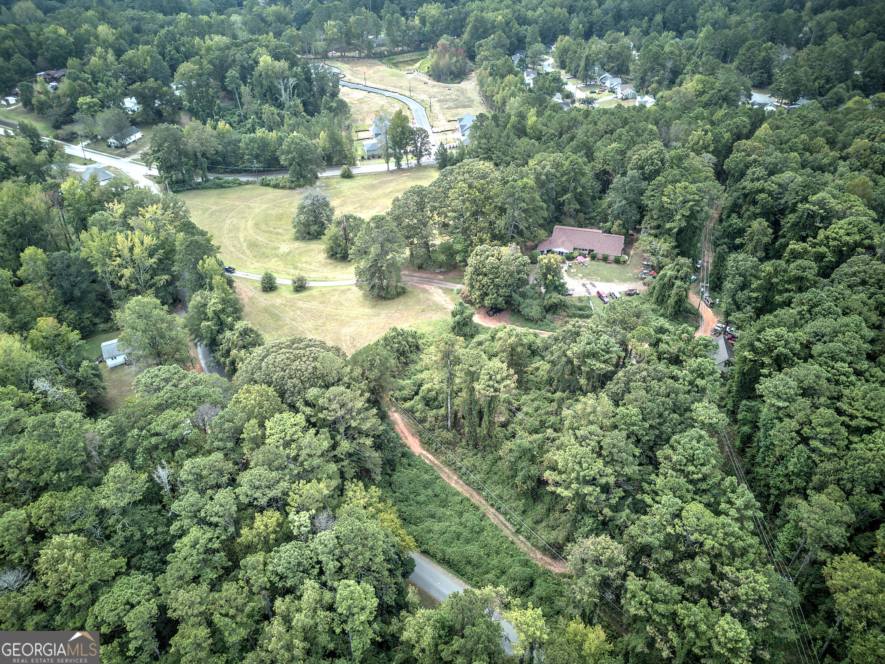 67 Polk Lane Dallas, GA 30132 - Photo 29 of 51 an aerial view of residential house with outdoor space and trees all around