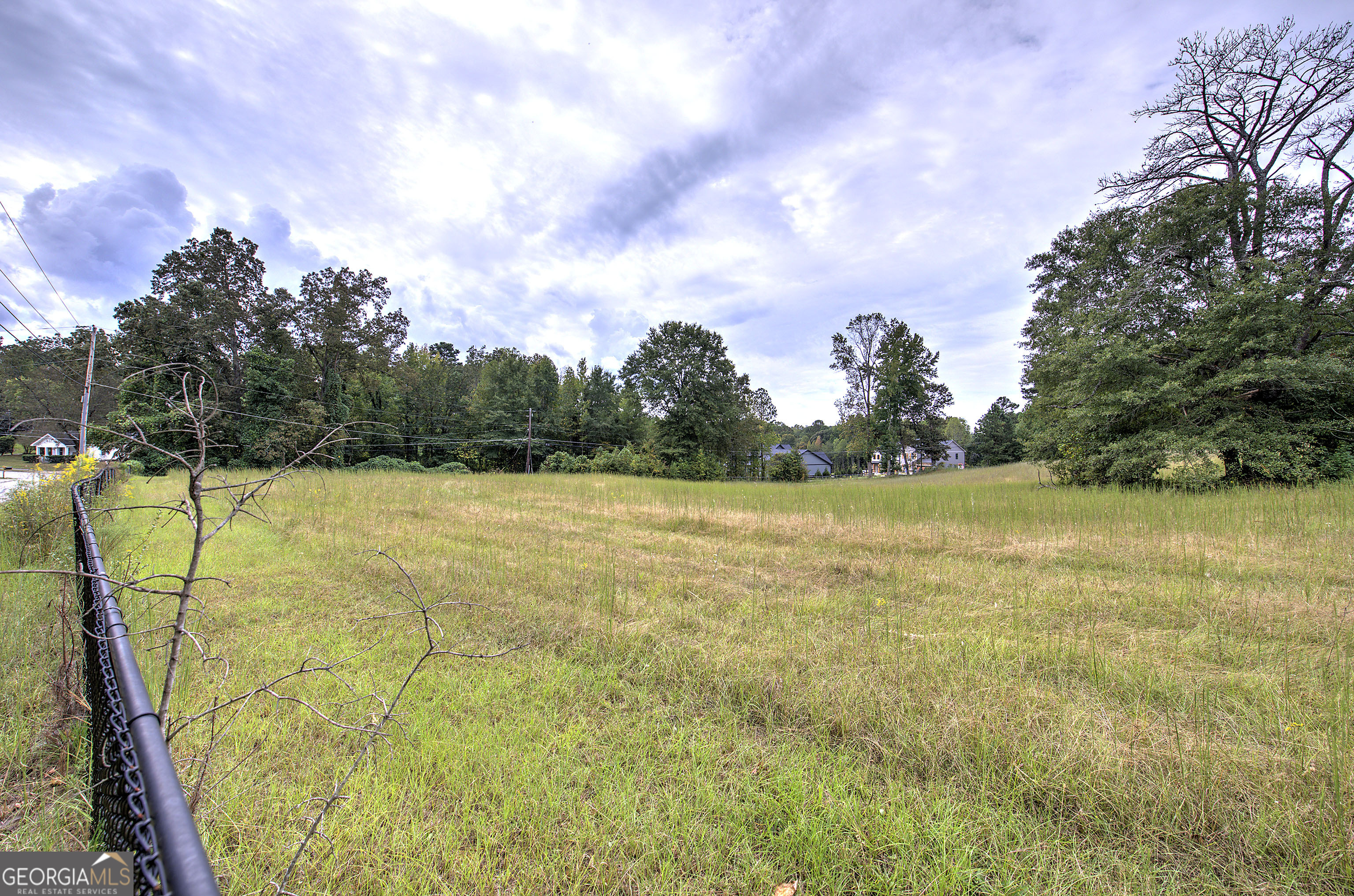 67 Polk Lane Dallas, GA 30132 - Photo 3 of 51 a view of a lake with a yard