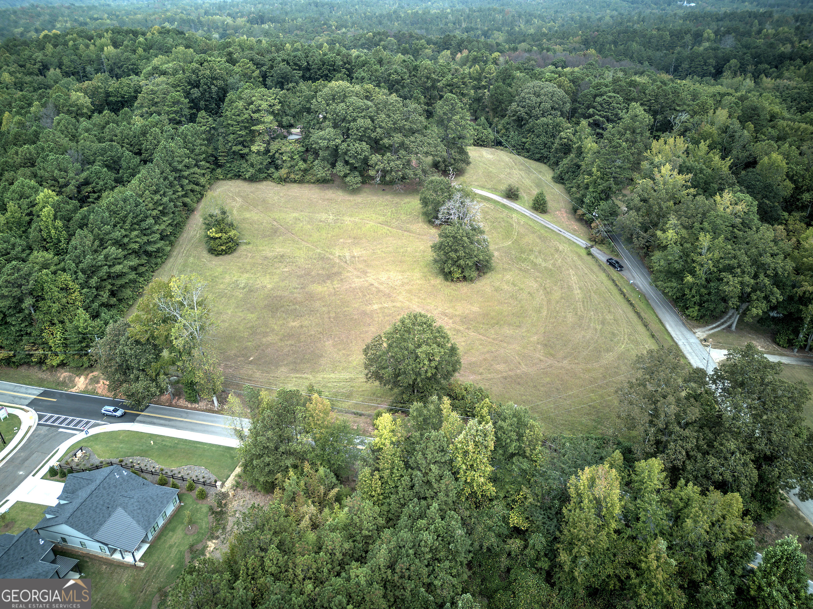 67 Polk Lane Dallas, GA 30132 - Photo 38 of 51 an aerial view of a house with a yard