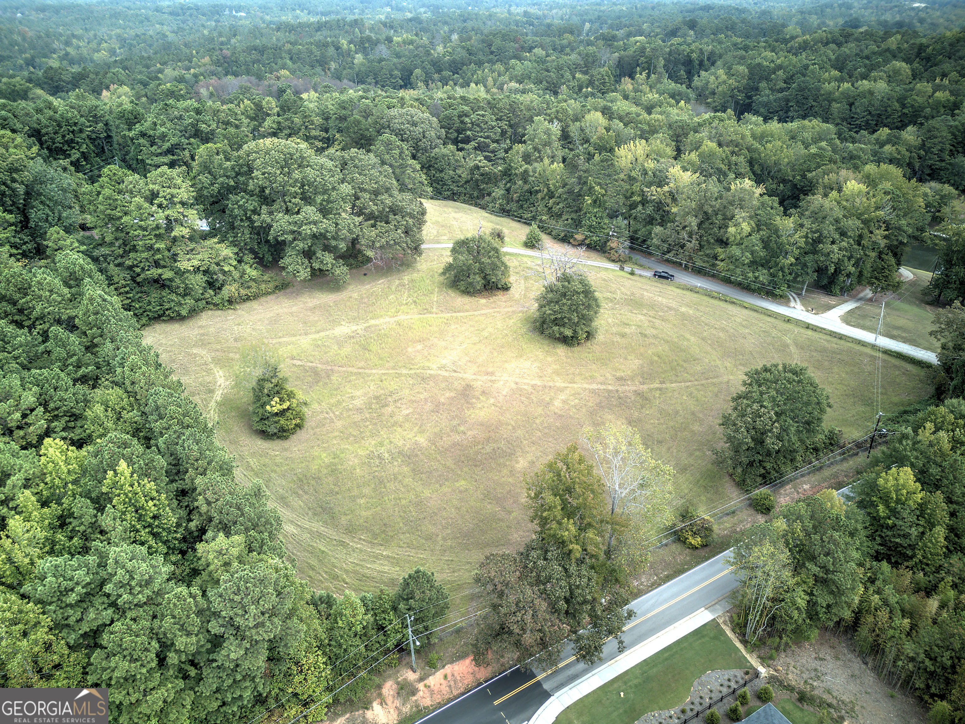 67 Polk Lane Dallas, GA 30132 - Photo 40 of 51 an aerial view of a house with yard