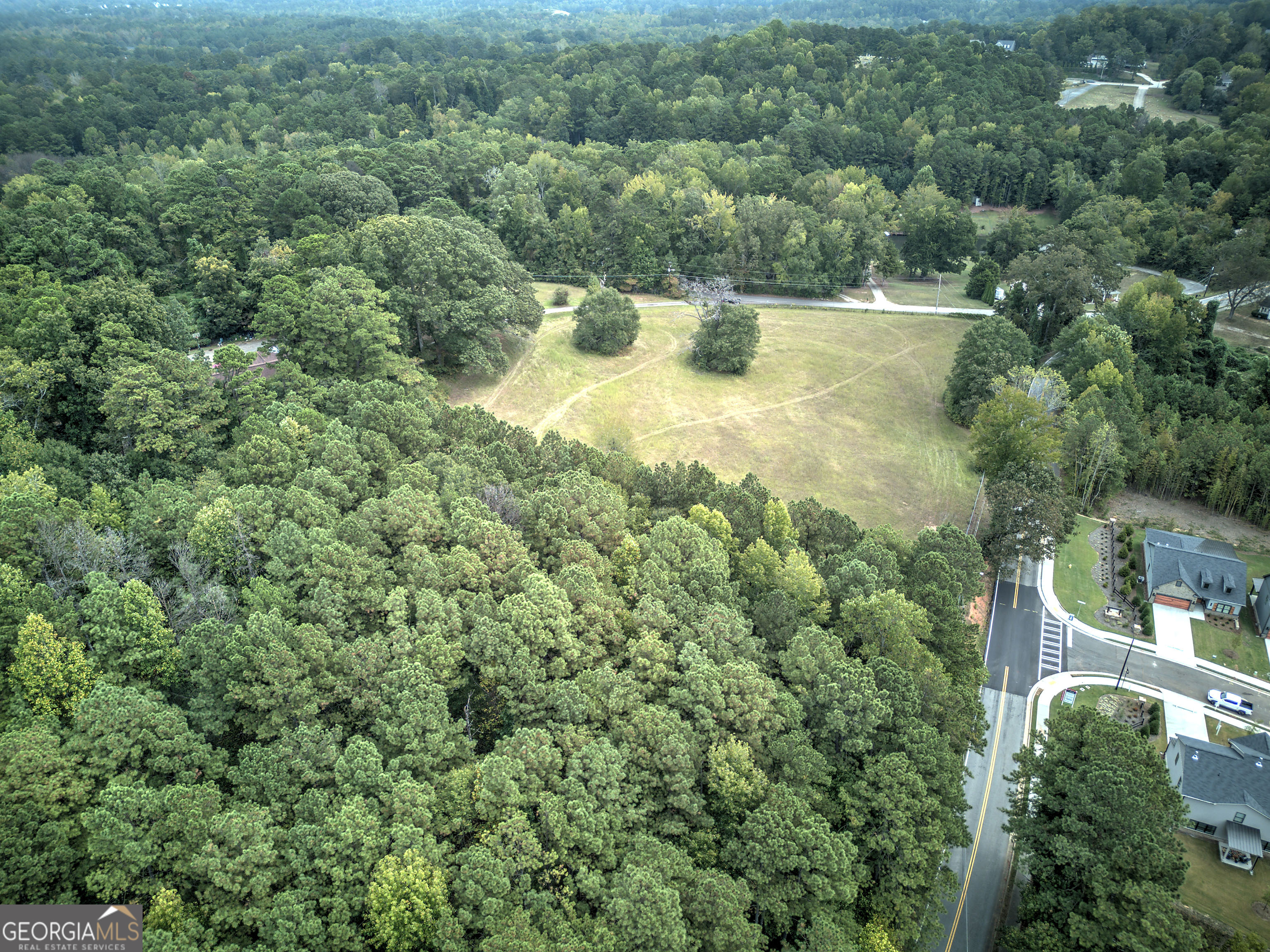 67 Polk Lane Dallas, GA 30132 - Photo 41 of 51 an aerial view of a house with yard and outdoor seating