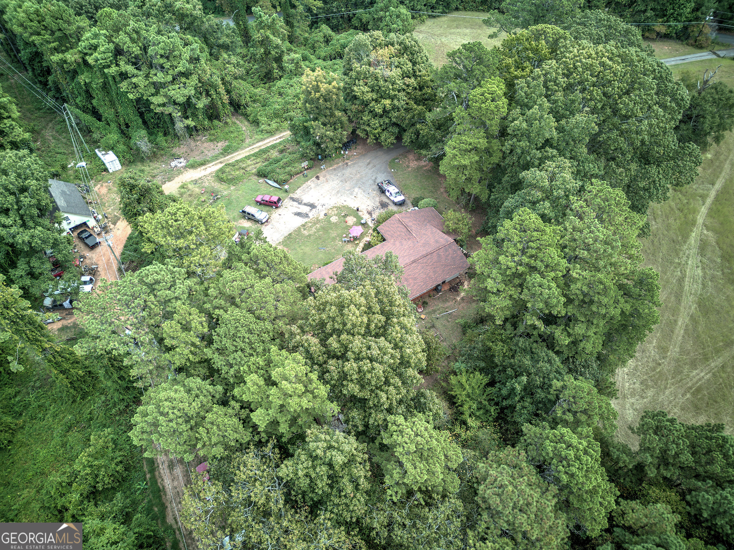 67 Polk Lane Dallas, GA 30132 - Photo 43 of 51 an aerial view of a house with a yard
