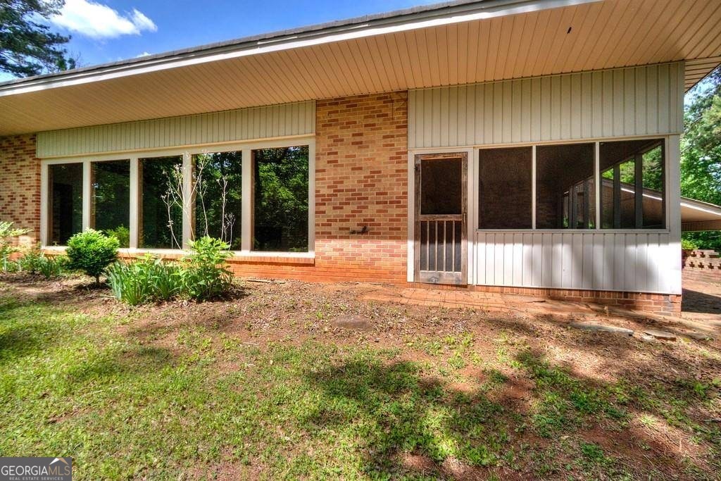 67 Polk Lane Dallas, GA 30132 - Photo 49 of 51 a view of a house with backyard and garden