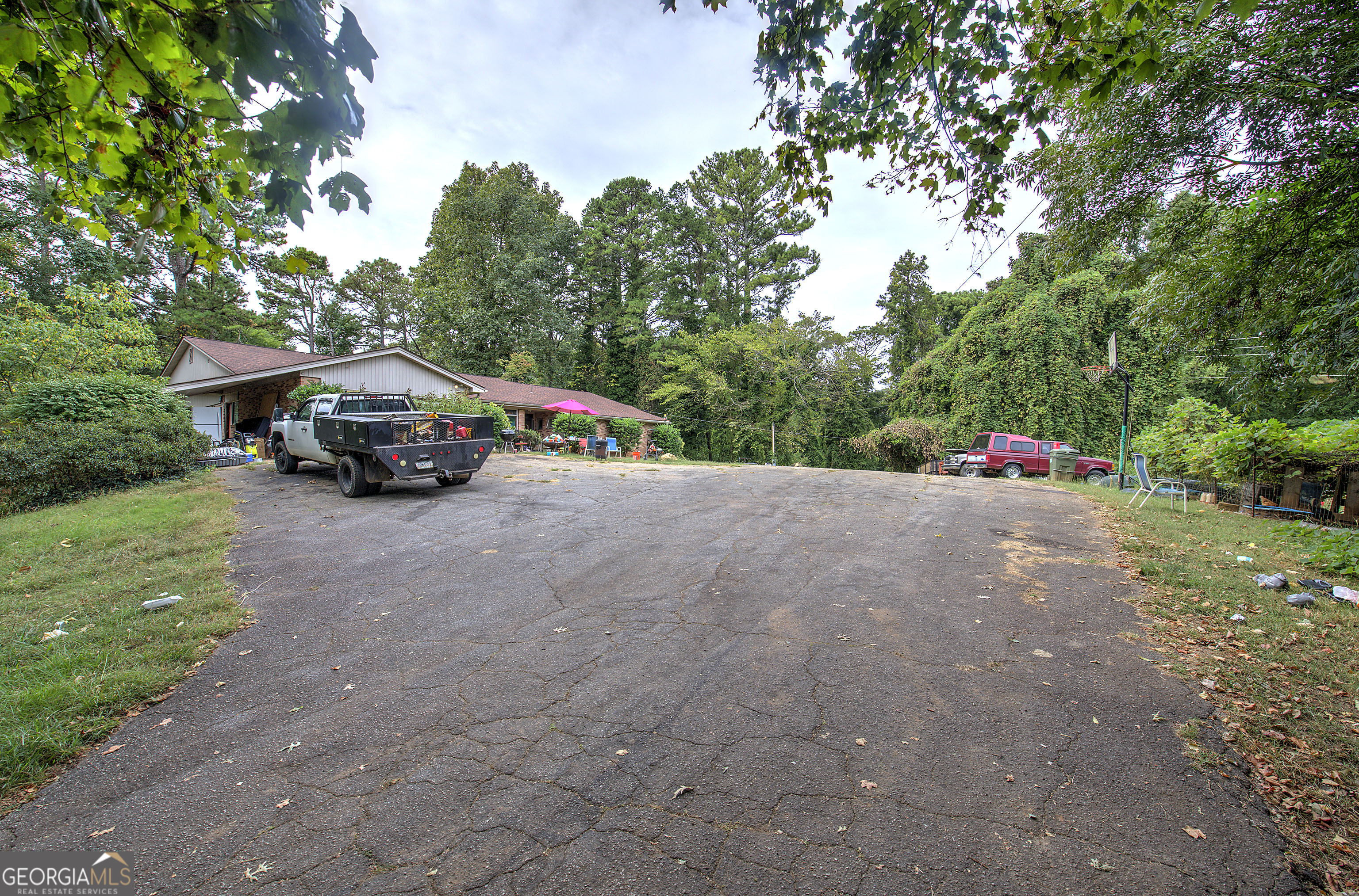 67 Polk Lane Dallas, GA 30132 - Photo 5 of 51 a view of street with parked cars
