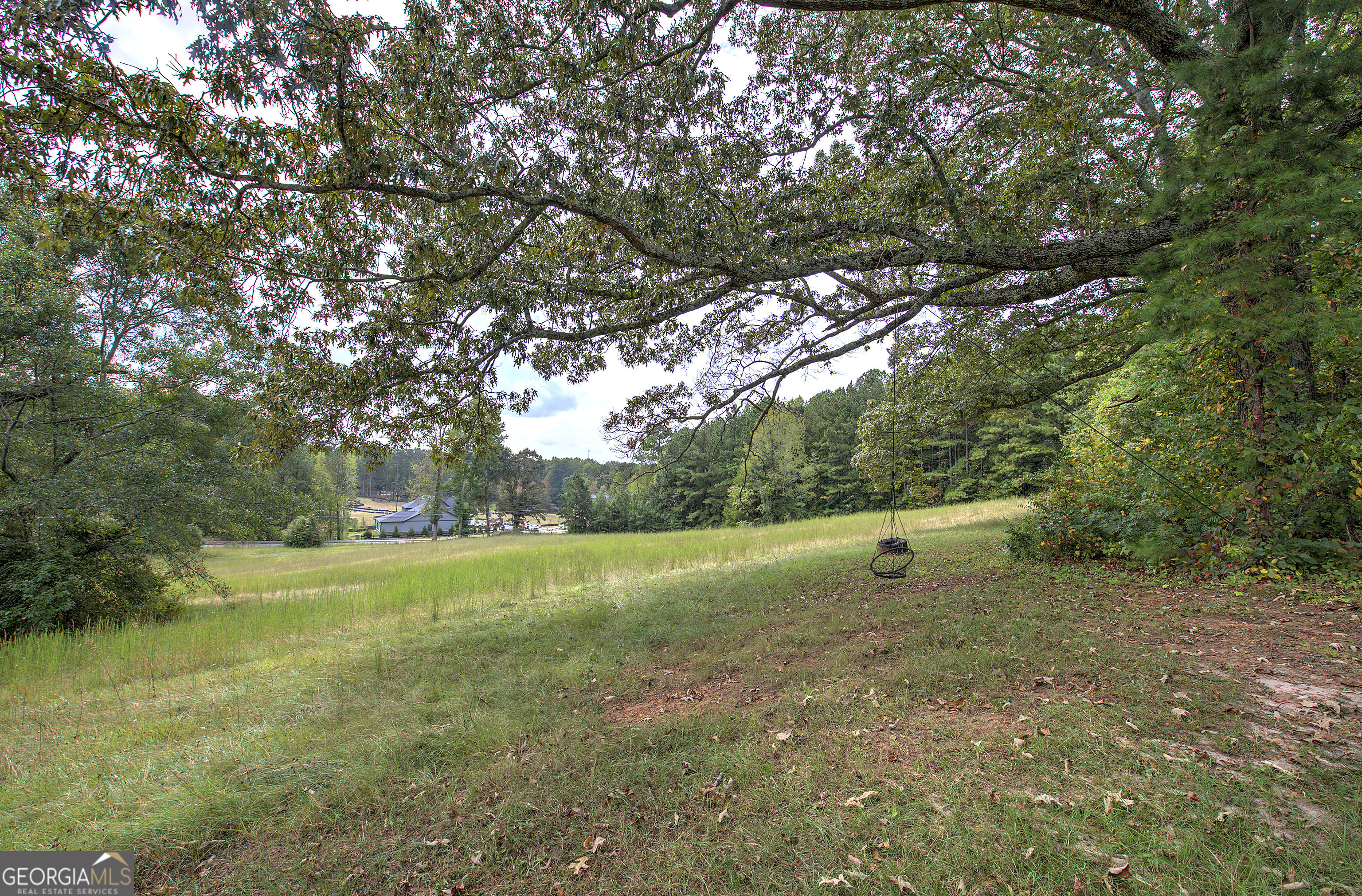 67 Polk Lane Dallas, GA 30132 - Photo 7 of 51 a view of outdoor space with trees all around
