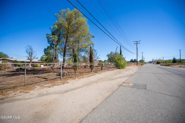 a view of a street with houses