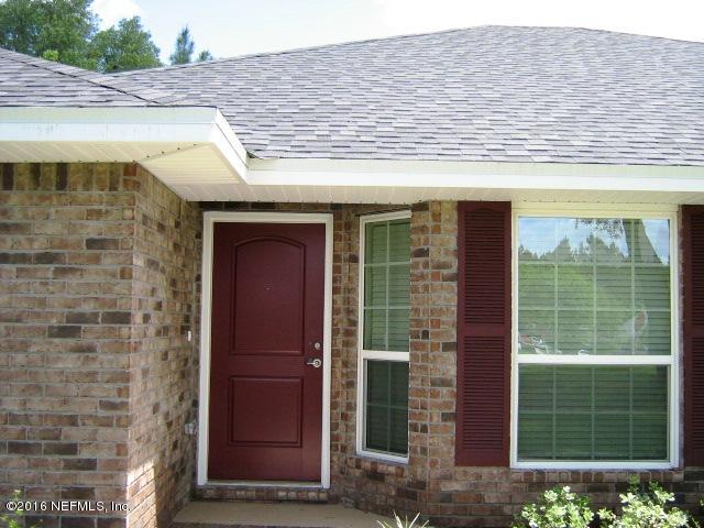 78341 Saddle Rock Road Yulee, FL 32097 - Photo 1 of 18 1930 Front