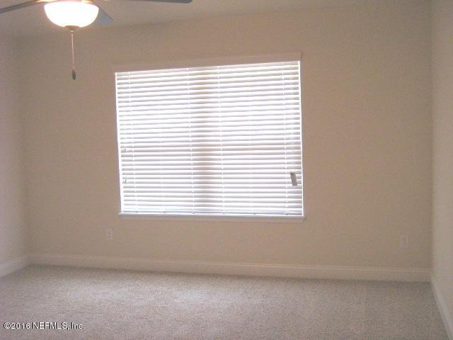 78341 Saddle Rock Road Yulee, FL 32097 - Photo 15 of 18 1930 Master Bedroom