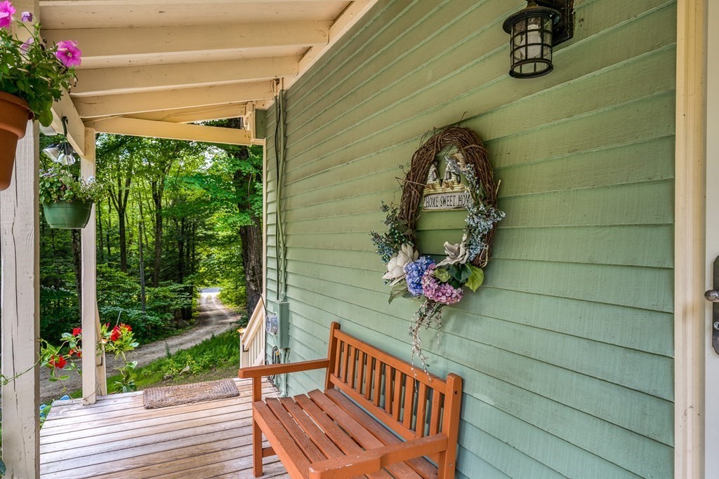 213 NW Road Westhampton, MA 01027 - Photo 5 of 42 a view of a porch with seating space