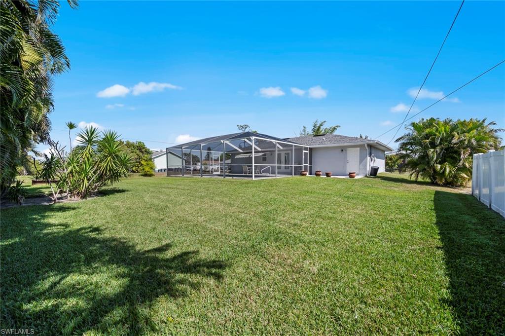 17528 Fuchsia Road Fort Myers, FL 33967 - Photo 6 of 42 a view of a house with a big yard