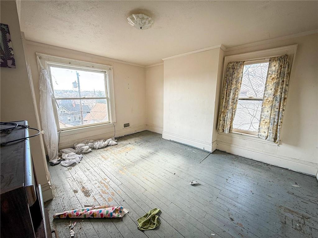 248 East Fulton Street Butler, PA 16001 - Photo 17 of 35 wooden floor and window in a room