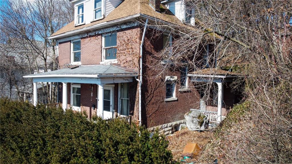 248 East Fulton Street Butler, PA 16001 - Photo 2 of 35 a view of a house with backyard and sitting area