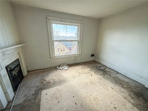 an empty room with windows
