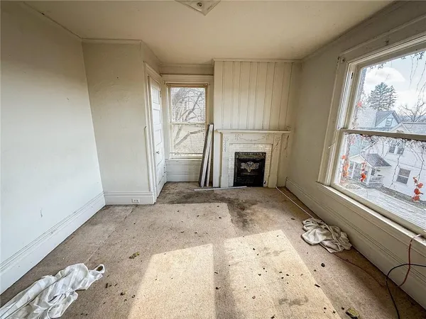 a view of livingroom with washer and dryer