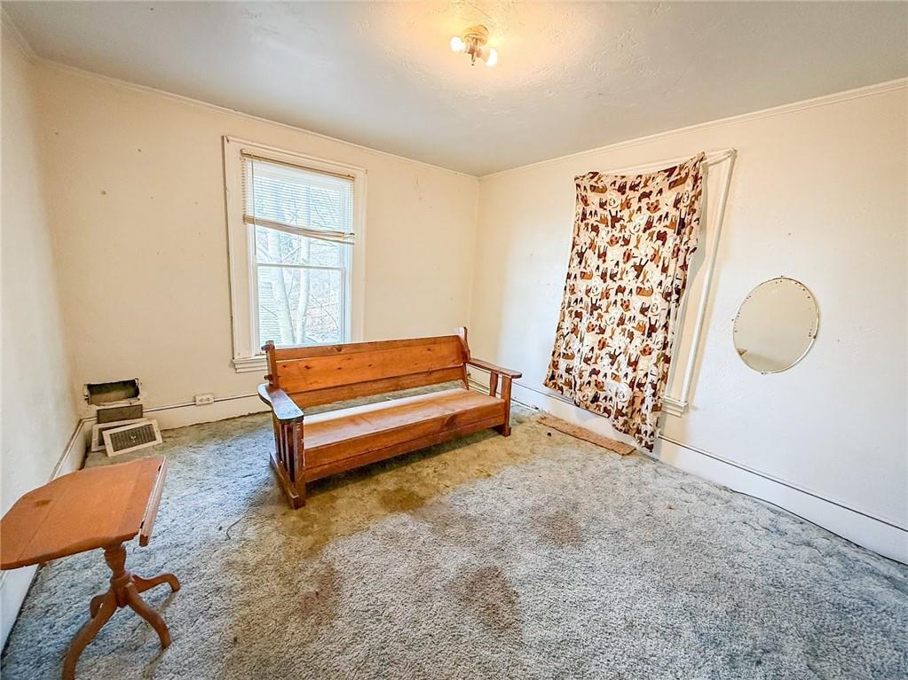 248 East Fulton Street Butler, PA 16001 - Photo 25 of 35 a backyard of a house with table and chairs