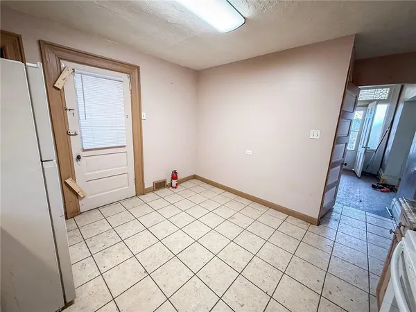 a view of a balcony with wooden floor