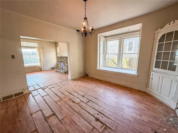 a view of livingroom with hardwood floor and window