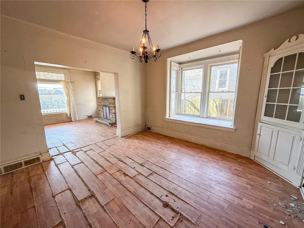 248 East Fulton Street Butler, PA 16001 - Photo 6 of 35 a view of livingroom with hardwood floor and window
