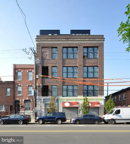 a front view of a building with street view