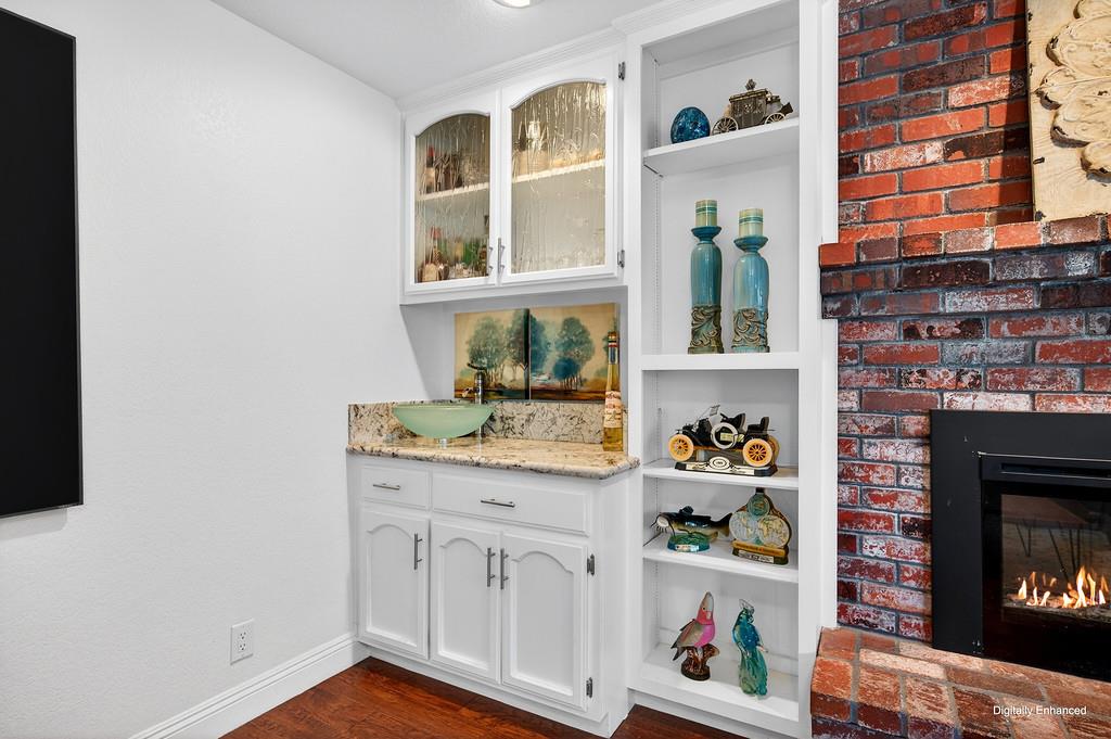 6610 Rio Oso Drive Rancho Murieta, CA 95683 - Photo 28 of 58 a kitchen with white cabinets and window