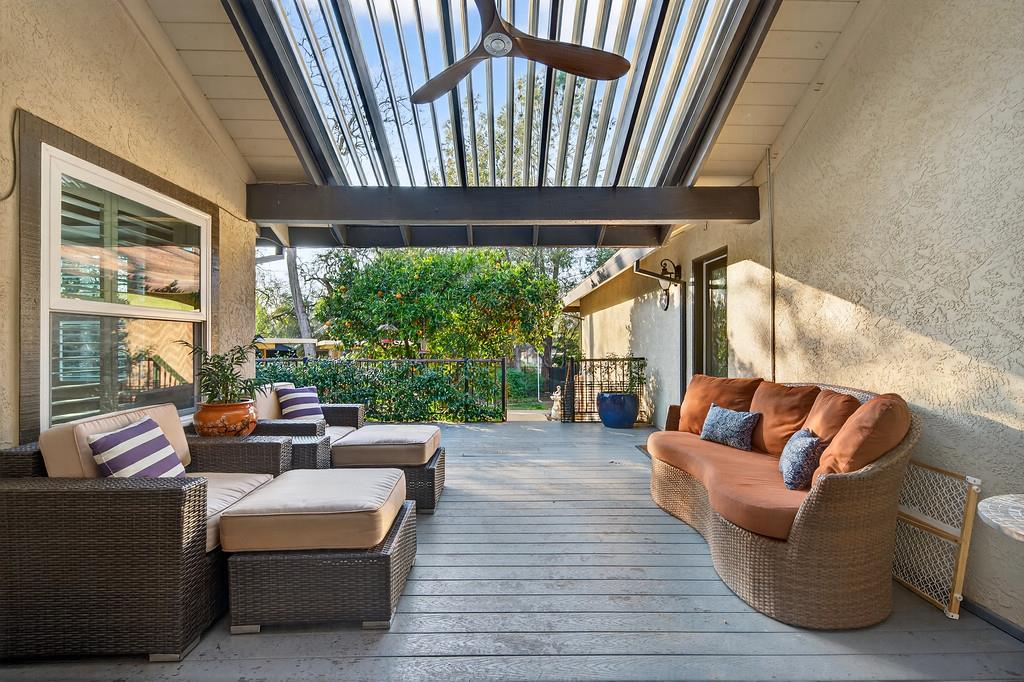 6610 Rio Oso Drive Rancho Murieta, CA 95683 - Photo 3 of 58 a living room with furniture and a large window