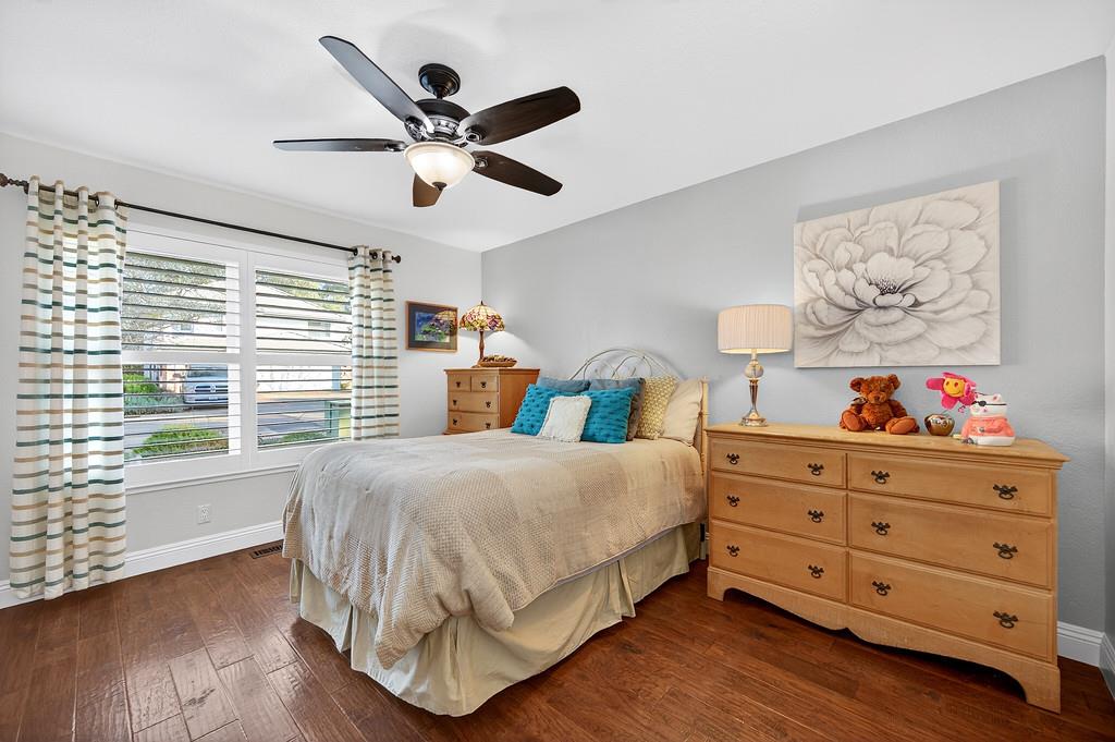 6610 Rio Oso Drive Rancho Murieta, CA 95683 - Photo 37 of 58 a bedroom with a bed and window