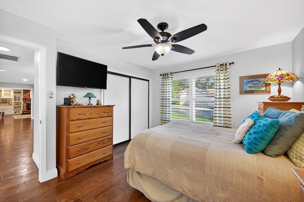 6610 Rio Oso Drive Rancho Murieta, CA 95683 - Photo 38 of 58 a bedroom with a bed and a flat screen tv