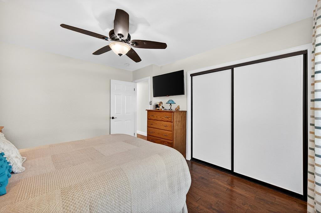 6610 Rio Oso Drive Rancho Murieta, CA 95683 - Photo 39 of 58 a bedroom with a bed and a flat screen tv