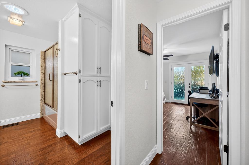 6610 Rio Oso Drive Rancho Murieta, CA 95683 - Photo 40 of 58 a view of a livingroom with wooden floor and furniture
