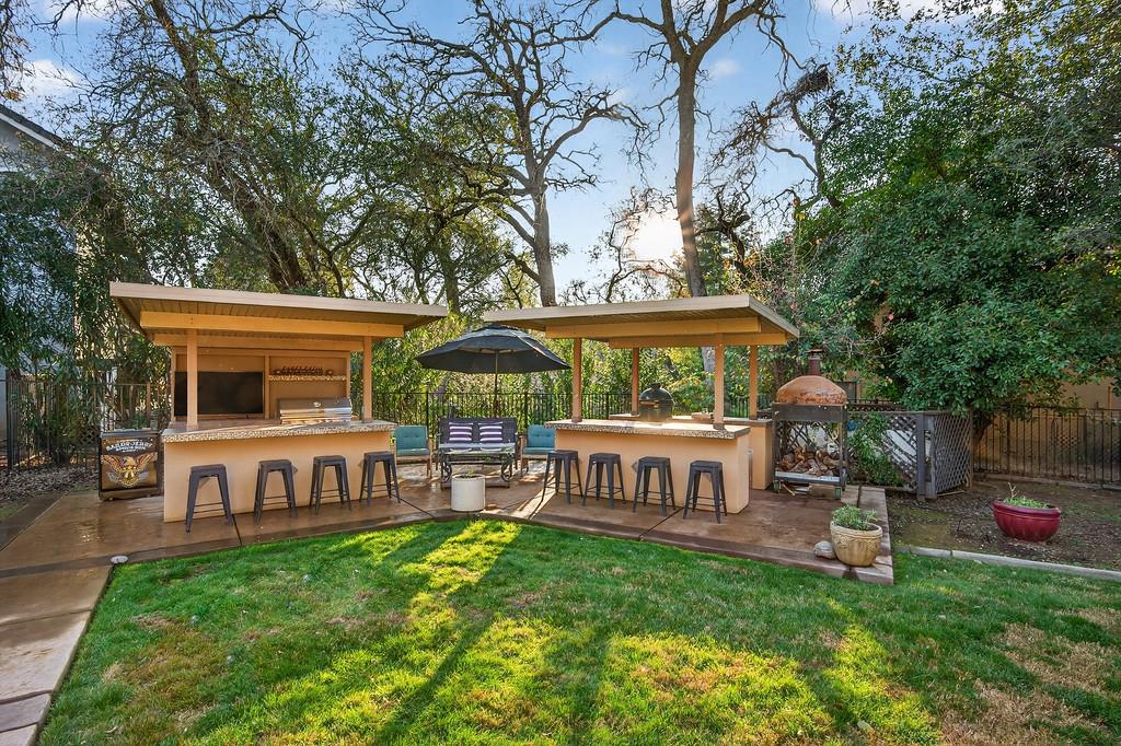 6610 Rio Oso Drive Rancho Murieta, CA 95683 - Photo 56 of 58 a view of a house with backyard and sitting area