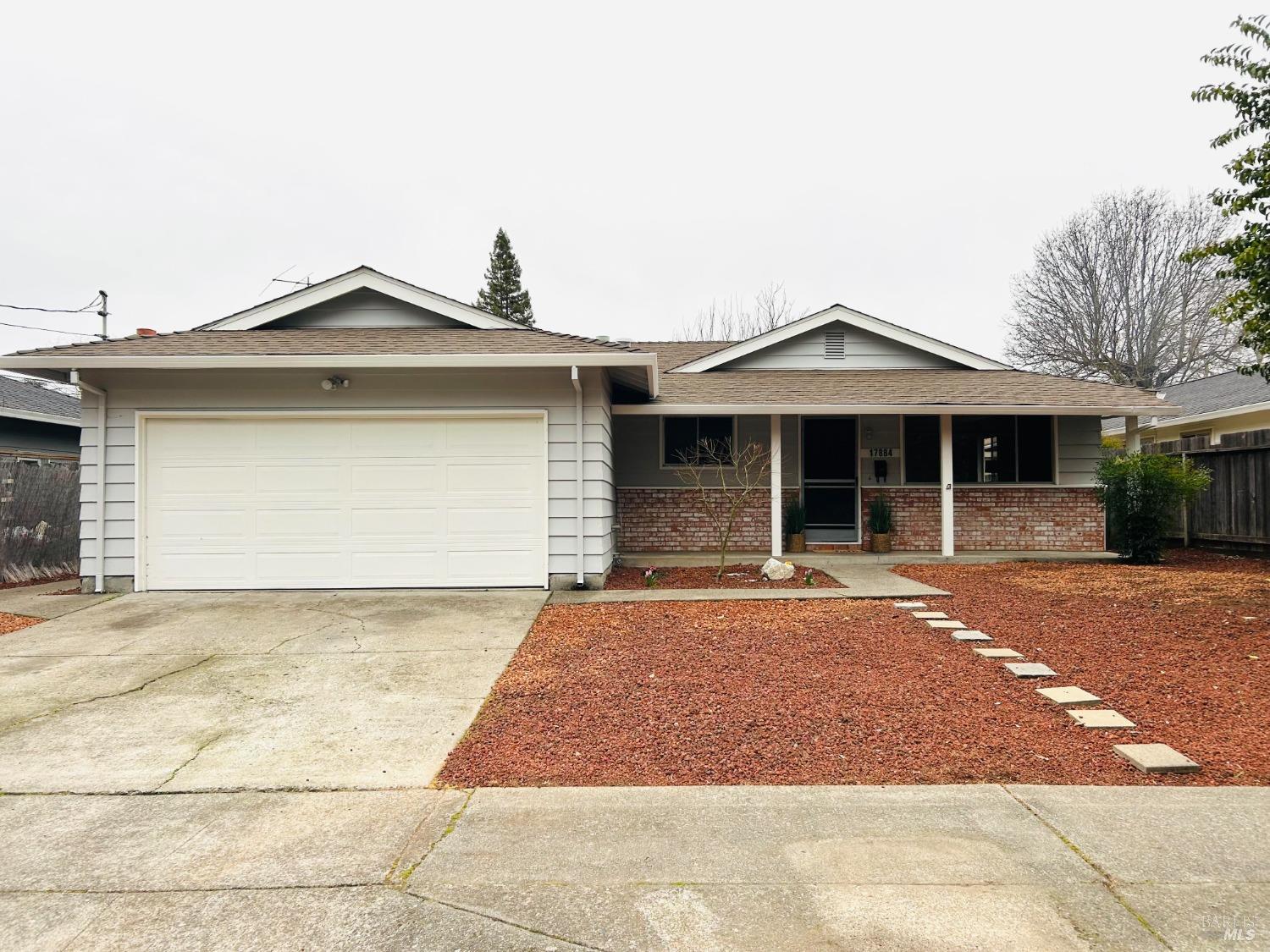 a front view of a house with yard