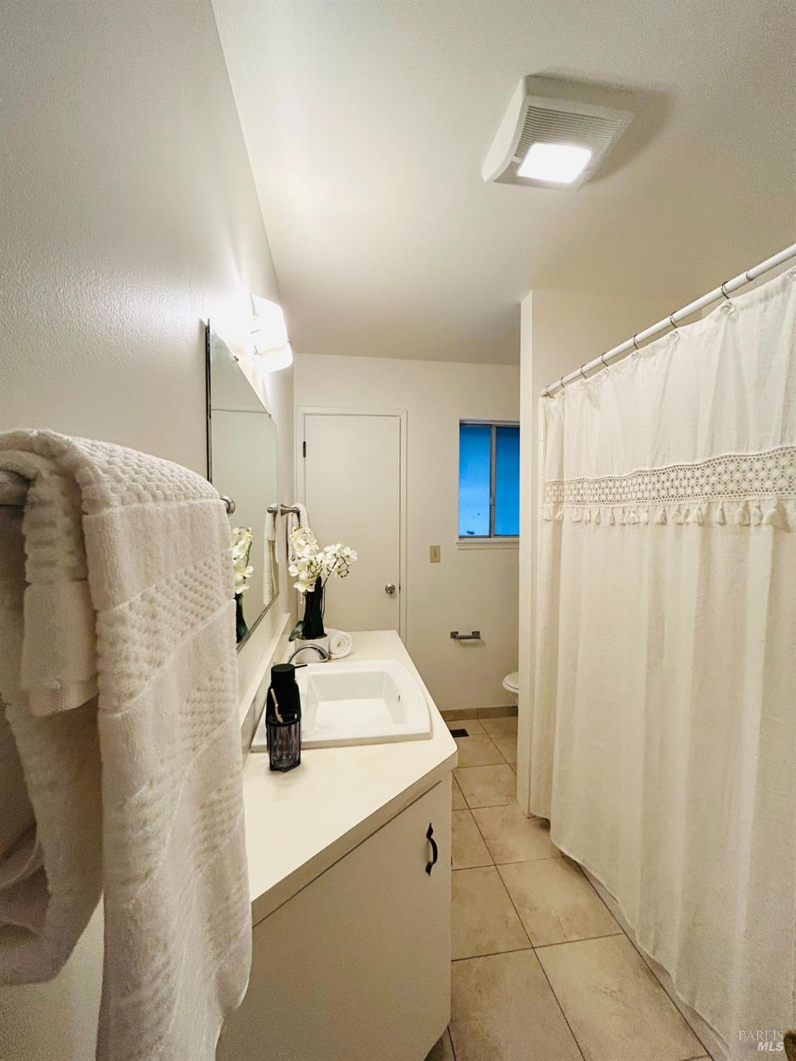 17884 Riverside Drive Sonoma, CA 95476 - Photo 18 of 20 a view of bathroom with a sink and mirror