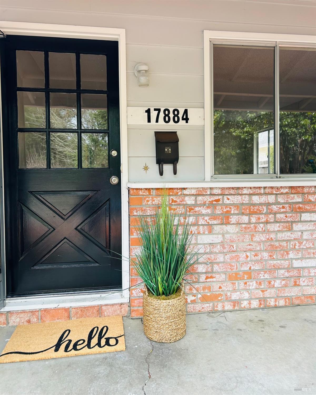 17884 Riverside Drive Sonoma, CA 95476 - Photo 2 of 20 a potted plant sitting on a brick wall